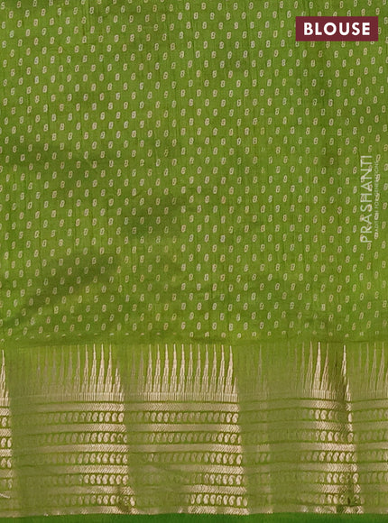 Semi raw silk saree light green with allover box type butta prints and zari woven border