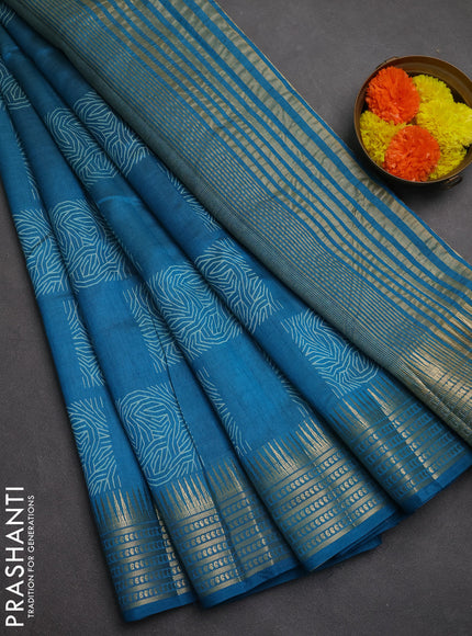 Semi raw silk saree cs blue with allover box type butta prints and zari woven border