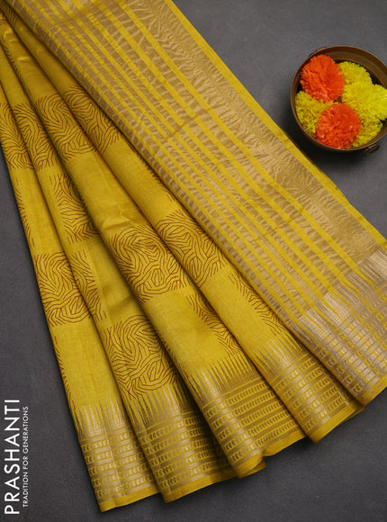 Semi raw silk saree yellow with allover box type butta prints and zari woven border