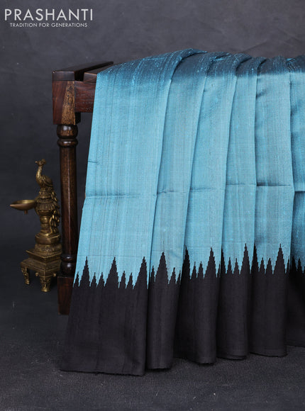 Pure dupion silk saree pastel blue and black with plain body and temple design simple border