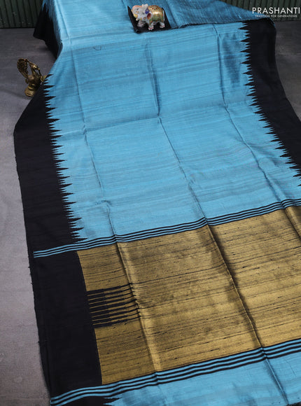Pure dupion silk saree pastel blue and black with plain body and temple design simple border