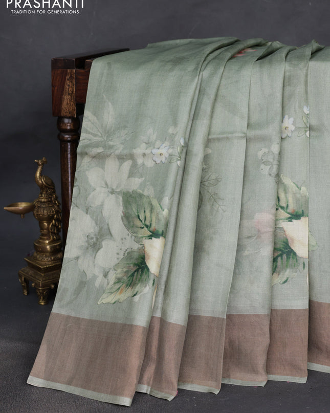 Pure tussar silk saree pastel green with floral digital prints and zari woven border