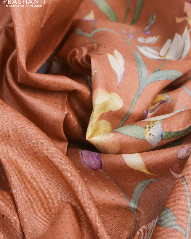Pure tussar silk saree rust shade with allover zari weaves and floral digital printed border