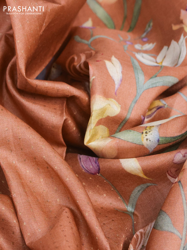 Pure tussar silk saree rust shade with allover zari weaves and floral digital printed border