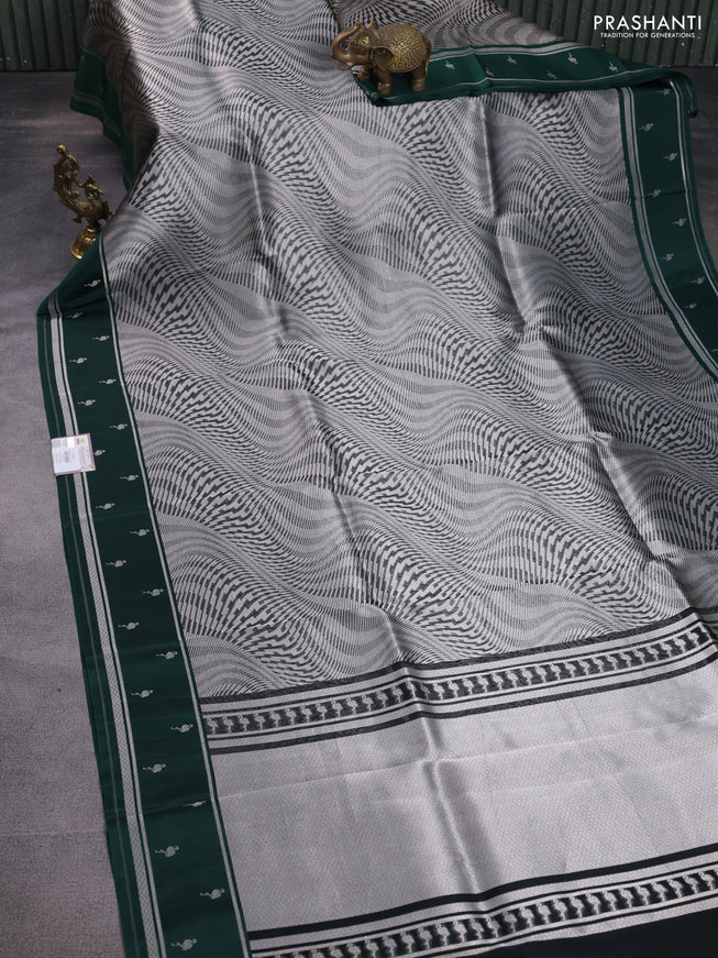 Banarasi katan silk saree bottle green with allover zari woven brocade weaves and zari woven butta border