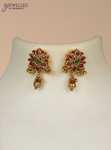 Black thread necklace with kemp stones and golden beads hangings
