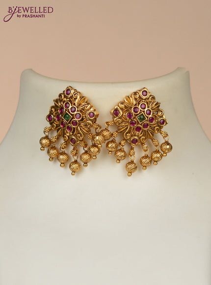 Black thread necklace with kemp stones and golden beads hangings
