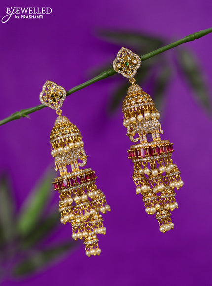 Antique jhumka elephant design with kemp & cz stones and pearl hangings