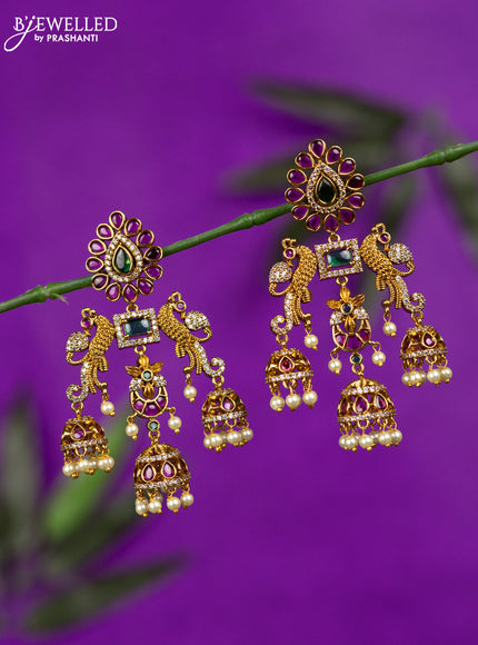 Antique jhumka peacock design with kemp & cz stones and pearl hangings