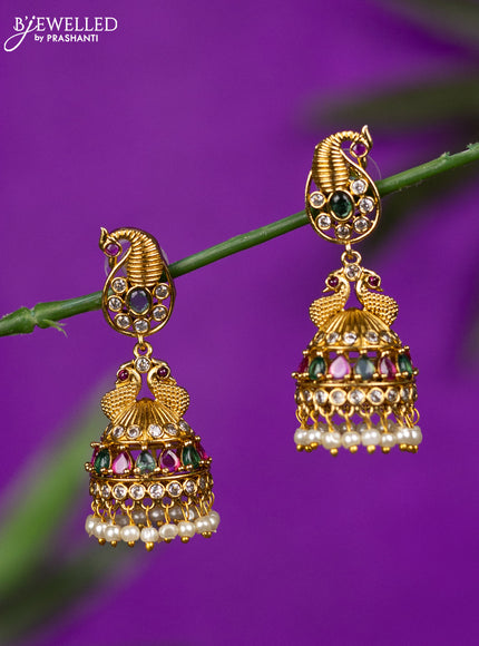 Antique jhumka peacock design with kemp & cz stones and pearl hangings