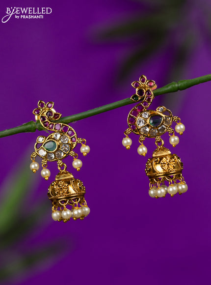 Antique jhumka peacock design with kemp & cz stones and pearl hangings