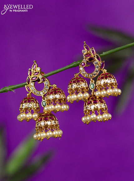 Antique jhumka peacock design with kemp & cz stones and pearl hangings