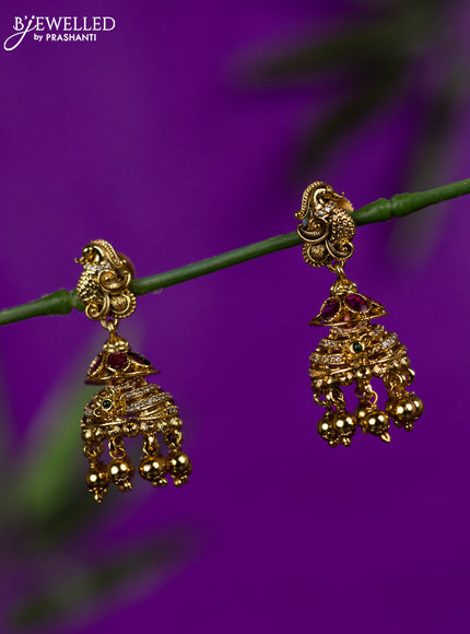 Antique jhumka with kemp stones and golden beads hangings