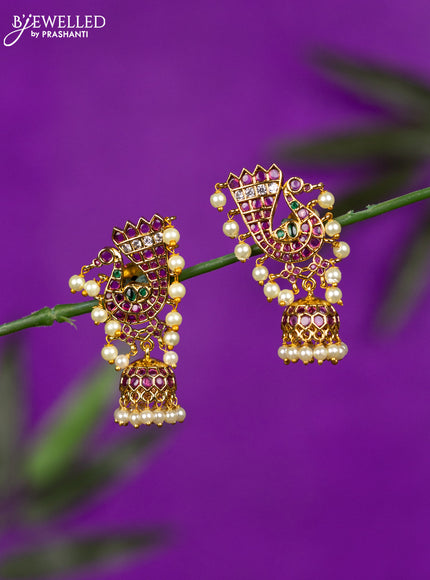 Antique jhumka peacock design with kemp & cz stones and pearl hangings