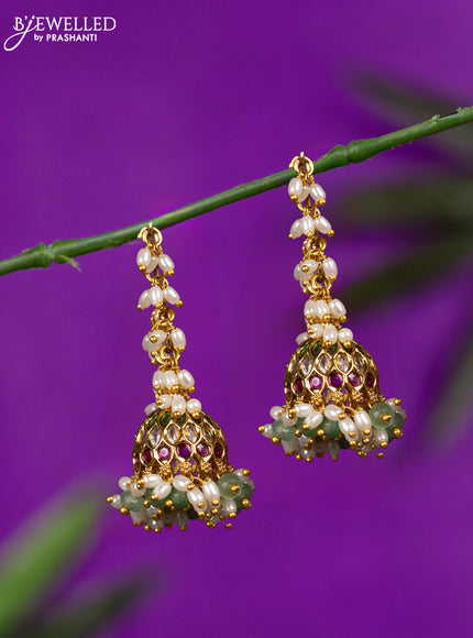 Antique hanging type jhumka with kemp & cz stones and pearl & mint green beads hangings