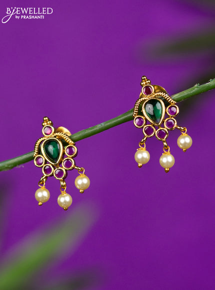 Antique earrings with kemp stones and pearl hangings