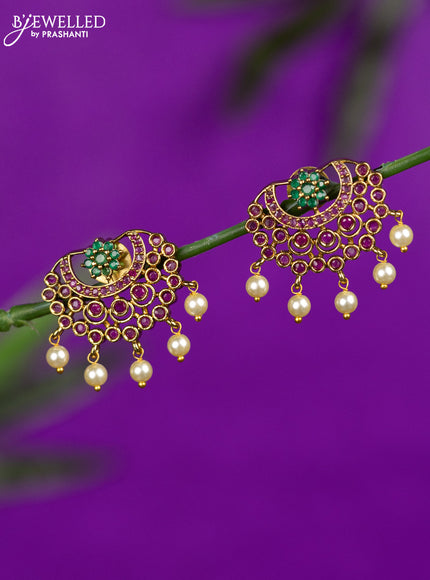 Antique earrings with kemp stones and pearl hangings