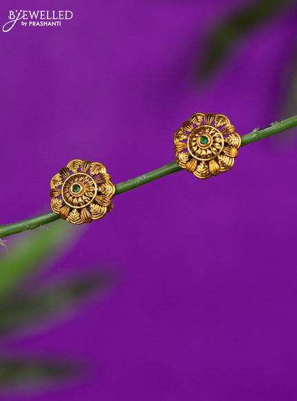 Antique earrings with emerald stones