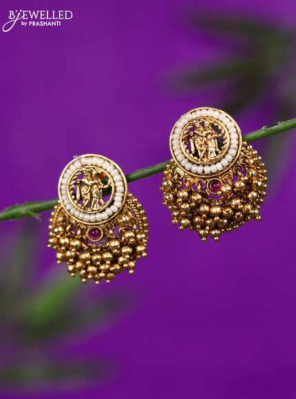 Antique earrings radha krishna design with ruby stone and golden beads hangings