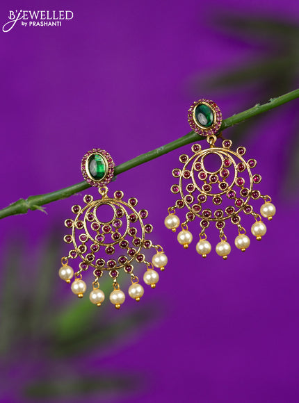 Antique earrings with kemp stones and pearl hangings
