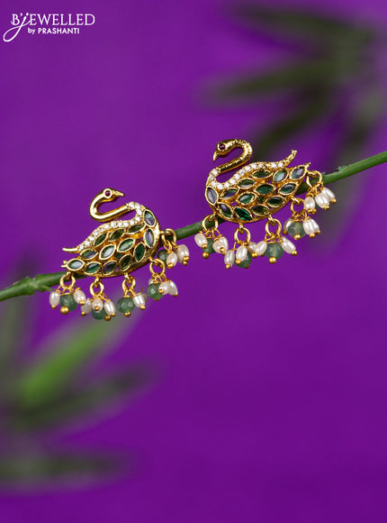 Antique earrings with emerald & cz stones and pearl hangings