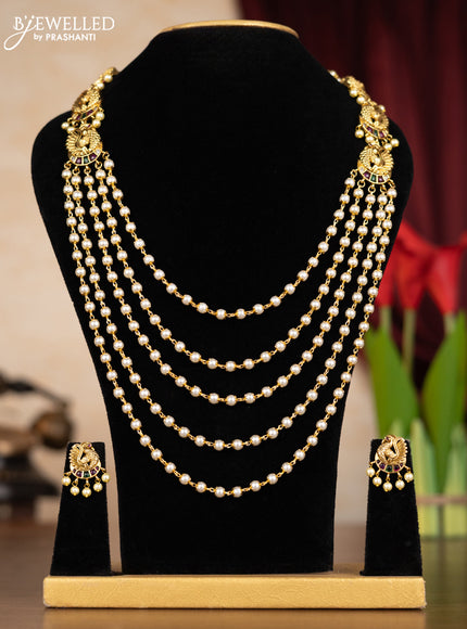 Pearl multilayer haaram peacock design with kemp & cz stones and pearl hangings