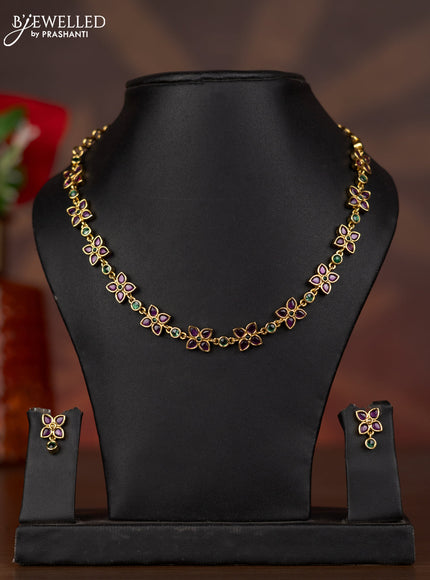 Antique necklace with floral design and kemp stones