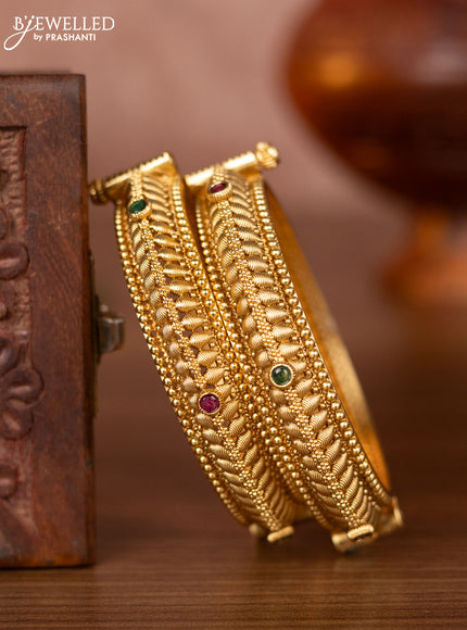 Antique screw type bangles with kemp stones