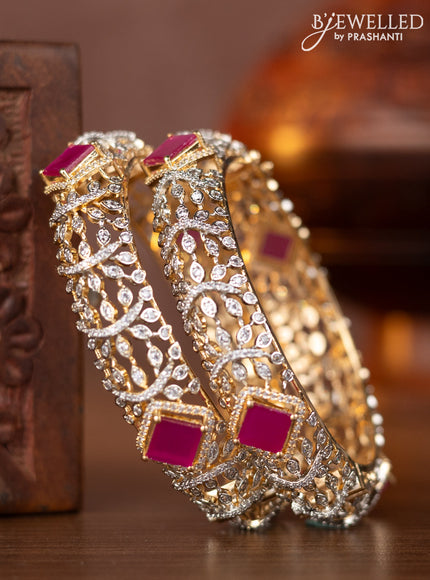 Zircon bangles with ruby and cz stones in gold finish