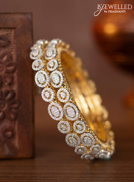 Zircon bangles with cz stones in gold finish
