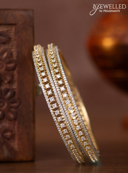 Zircon bangles with cz stones in gold finish