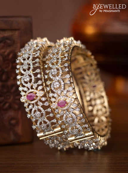 Zircon bangles with ruby and cz stones in gold finish
