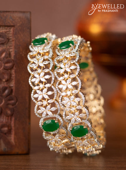 Zircon bangles with emerald and cz stones in gold finish