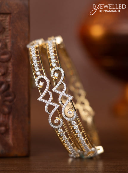 Zircon bangles with cz stones in gold finish