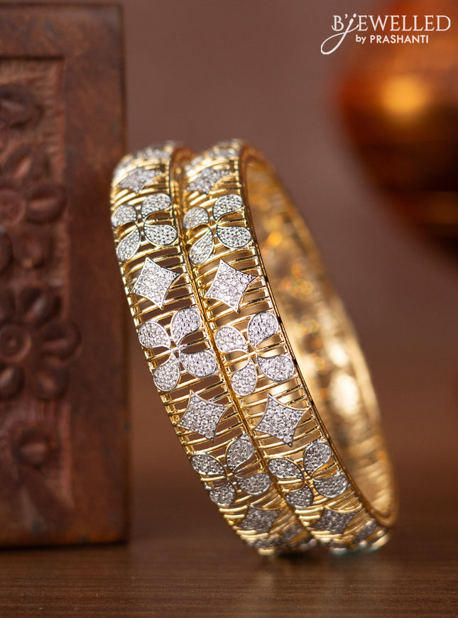 Zircon bangles with cz stones in gold finish