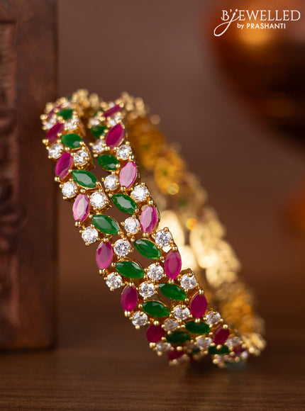 Zircon bangles with ruby & emerald and cz stones in gold finish