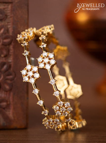 Zircon bangles with cz stones in gold finish