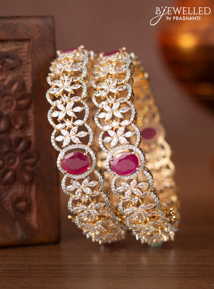 Zircon bangles with ruby and cz stones in gold finish