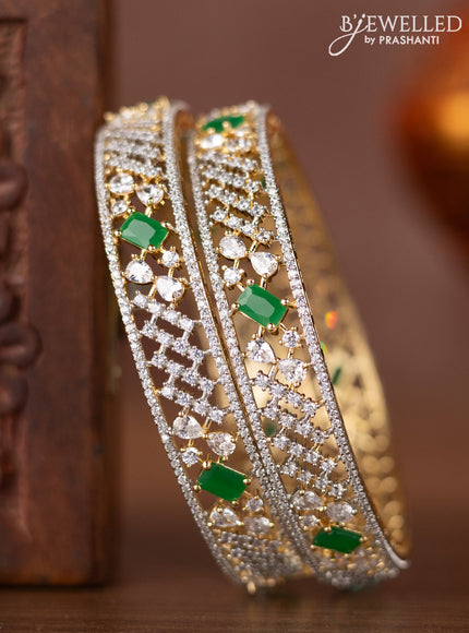 Zircon bangles with emerald and cz stones in gold finish