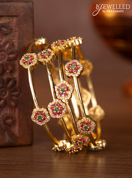 Zircon bangles with ruby & emerald and cz stones in gold finish