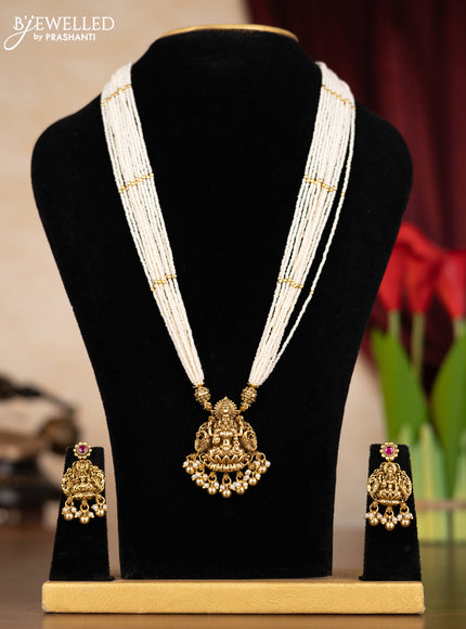 Pearl necklace reversible pendant lakshmi & chandbali design with kemp stones and golden beads hangings