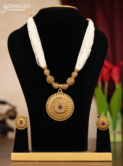 Pearl necklace with simple design and ruby and cz stones