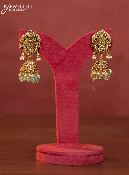 Pearl haaram shivan parvathi pendant with pink jadau stones and mint green beads hangings