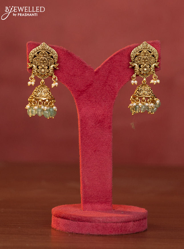 Pearl haaram shivan parvathi pendant with pink jadau stones and mint green beads hangings