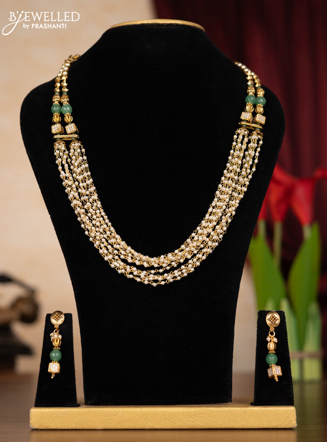 Pearl multilayer necklace with simple design and cz stones