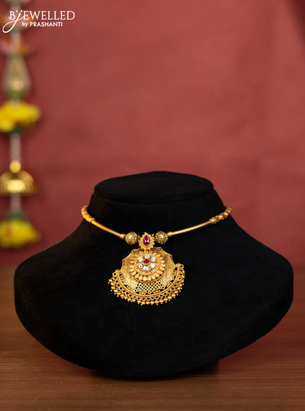 Ring type choker with ruby & kundan stones and golden beads hangings
