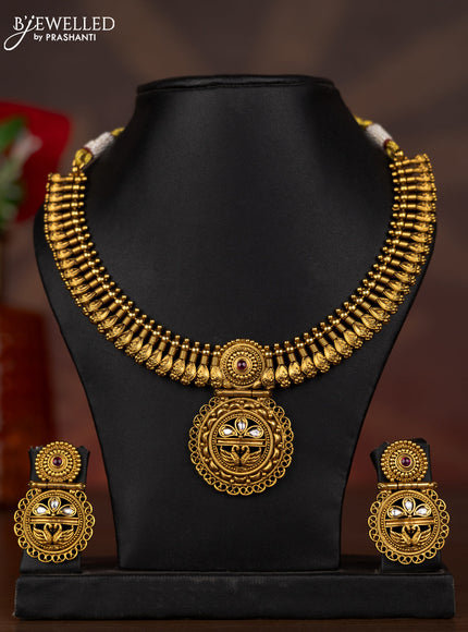 Antique necklace with ruby and kundan stones