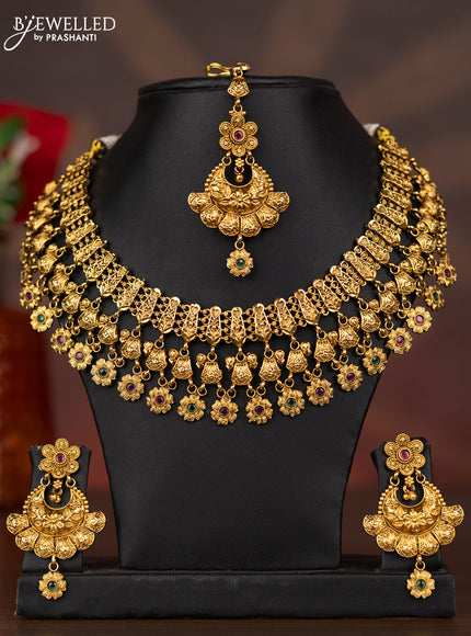 Antique necklace with floral design and kemp stones
