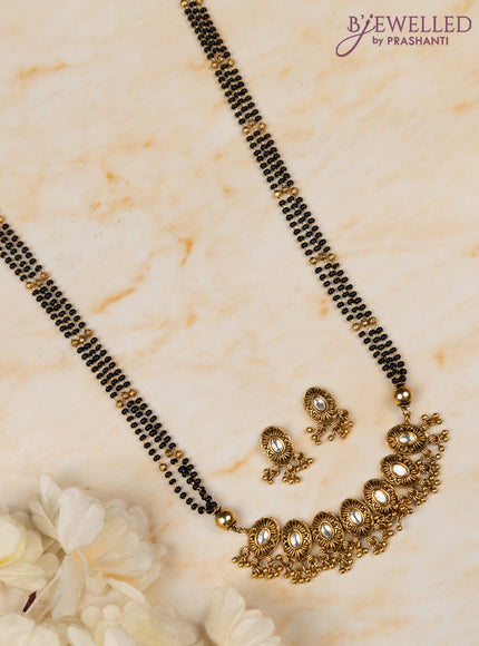 Mangalsutra triple layer with kundan stones and golden beads hangings