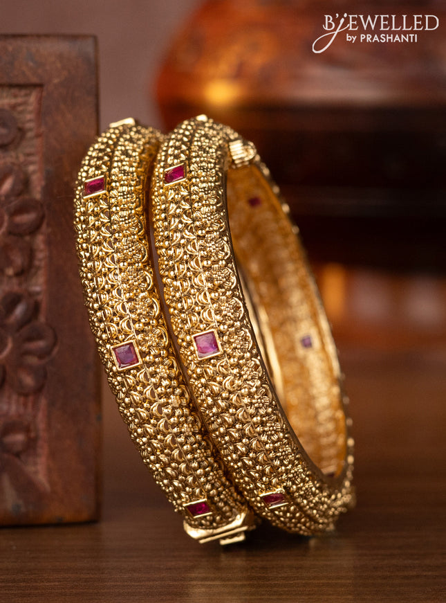 Antique screw type bangles with ruby stones